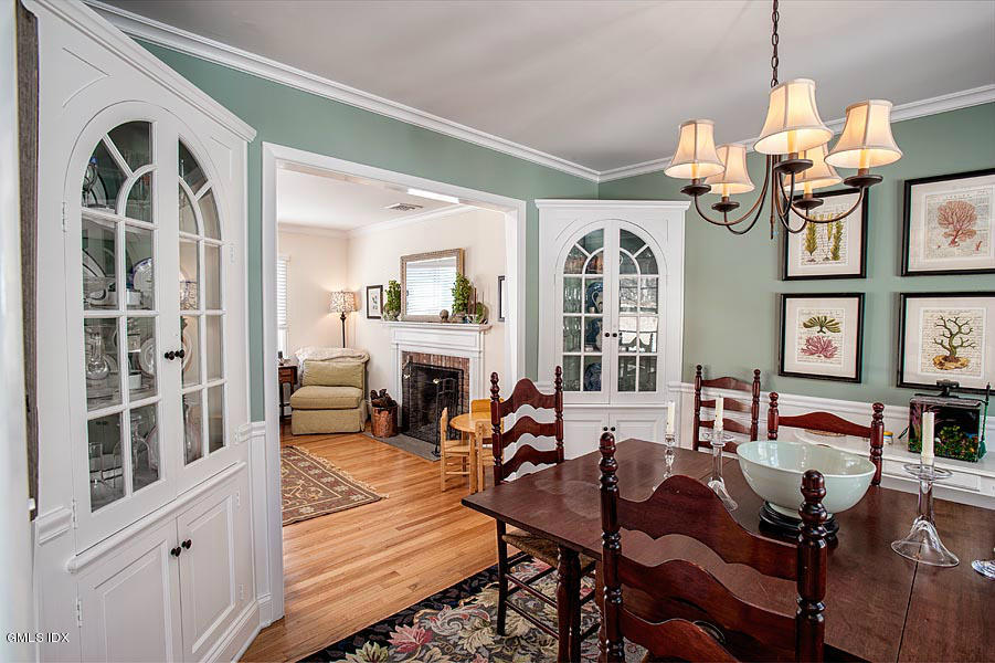 42 Field Road Cos Cob, CT 06807 - Photo 6 of 14 a view of a dining room with furniture chandelier and wooden floor
