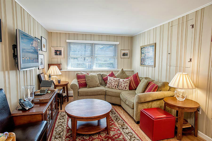 42 Field Road Cos Cob, CT 06807 - Photo 8 of 14 a living room with furniture a couch and a window