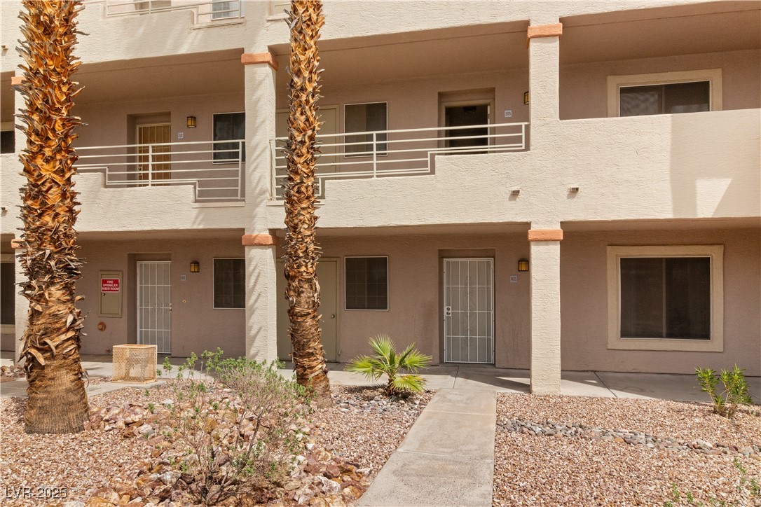 2036 Mesquite Lane, Unit 103 Laughlin, NV 89029 - Photo 3 of 67 View of front of property with a balcony and stucco siding