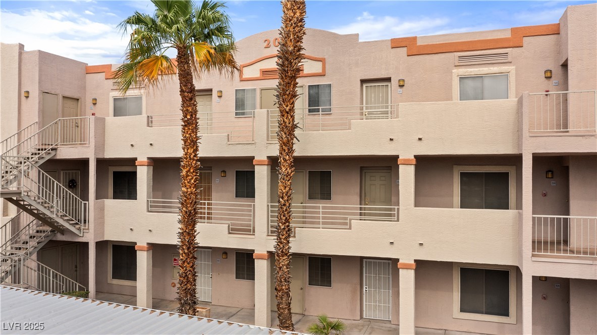 2036 Mesquite Lane, Unit 103 Laughlin, NV 89029 - Photo 37 of 67 View of building exterior featuring stairway