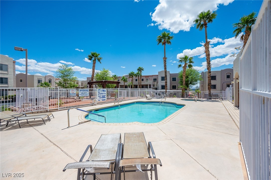 2036 Mesquite Lane, Unit 103 Laughlin, NV 89029 - Photo 50 of 67 Pool featuring fence and a patio area