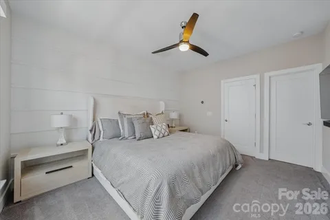 a bathroom with double sink and a mirror