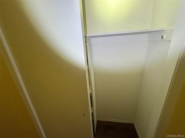 a bathroom with a glass door