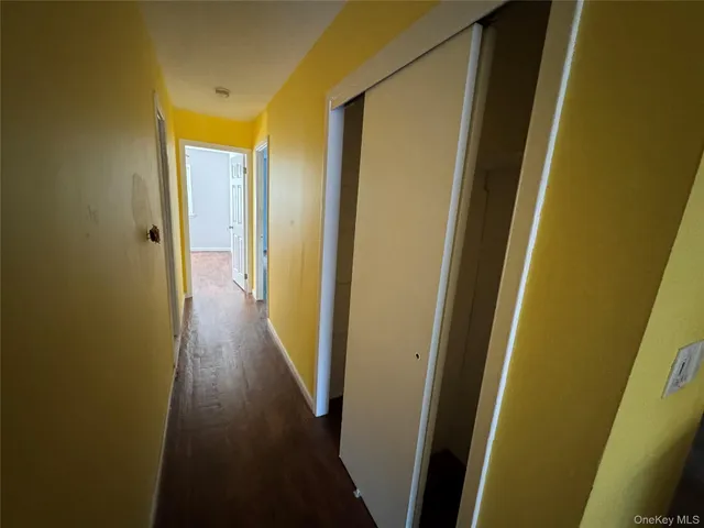 a view of a bathroom from a hallway