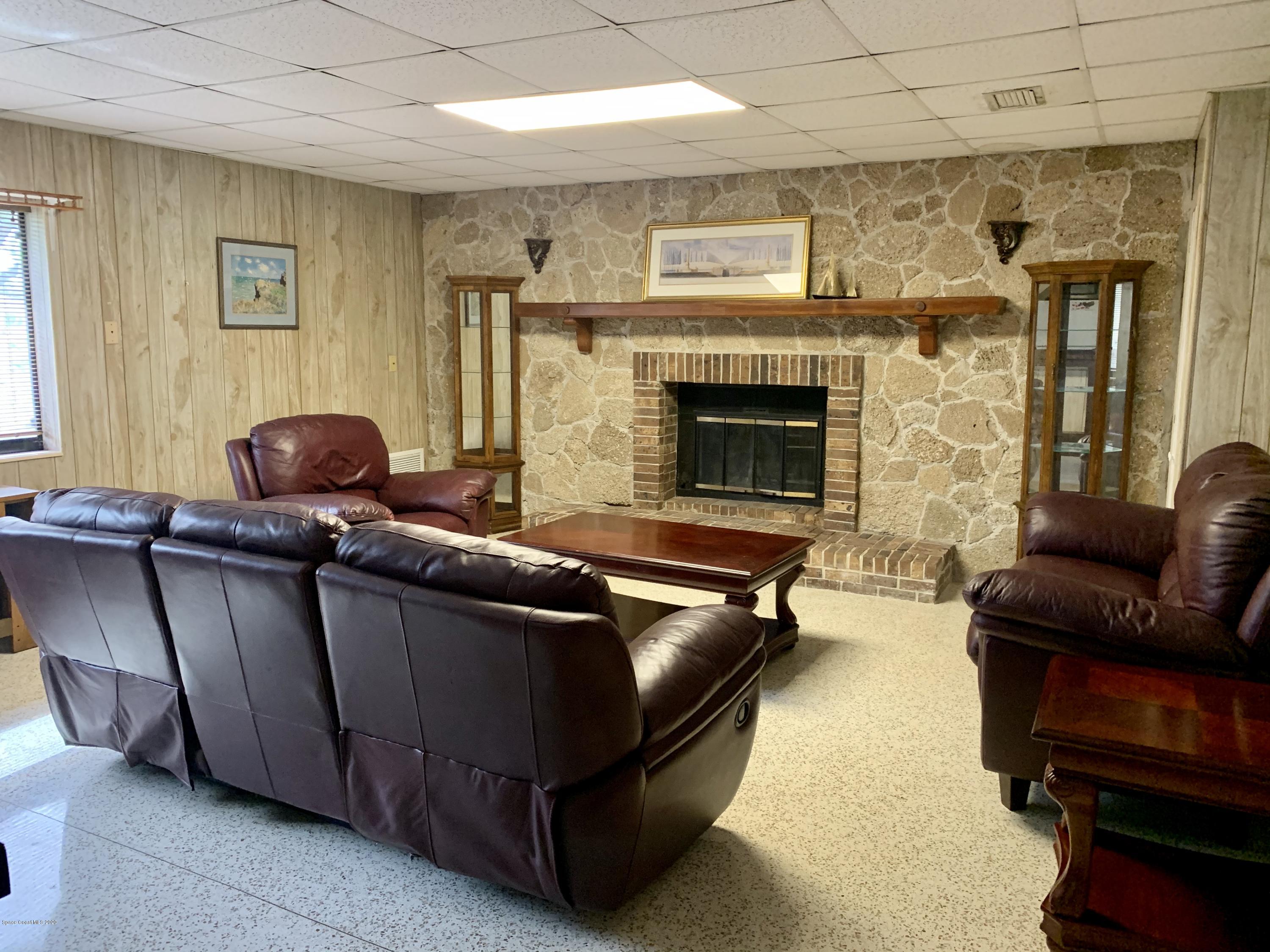 1007 Croton Road Melbourne, FL 32935 - Photo 5 of 11 Fireplace in backroom