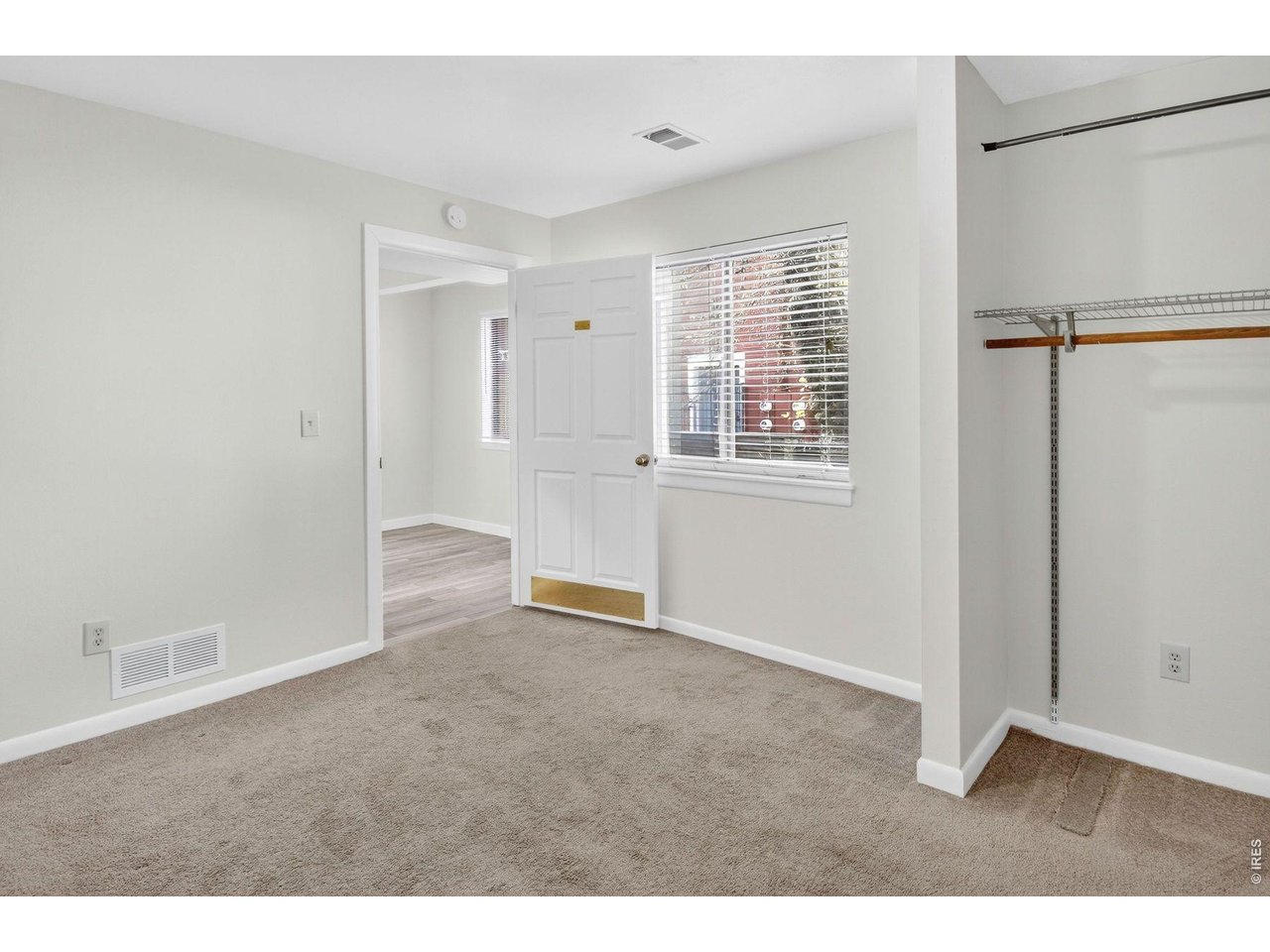 2317 Walnut Street Boulder, CO 80302 - Photo 12 of 34 a view of an empty room with a window
