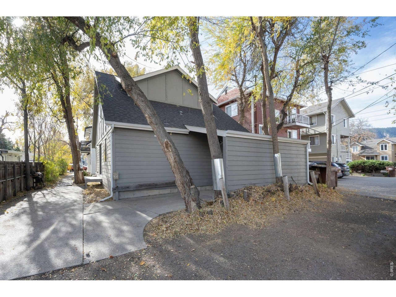 2317 Walnut Street Boulder, CO 80302 - Photo 31 of 34 a backyard of a house with table and chairs