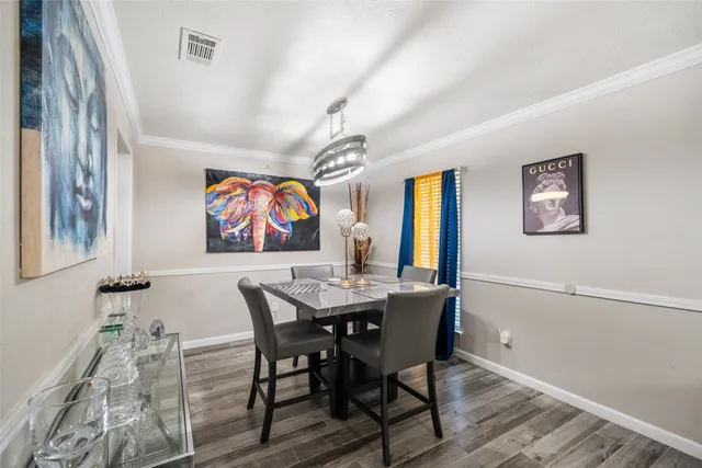 a view of a dining room with furniture