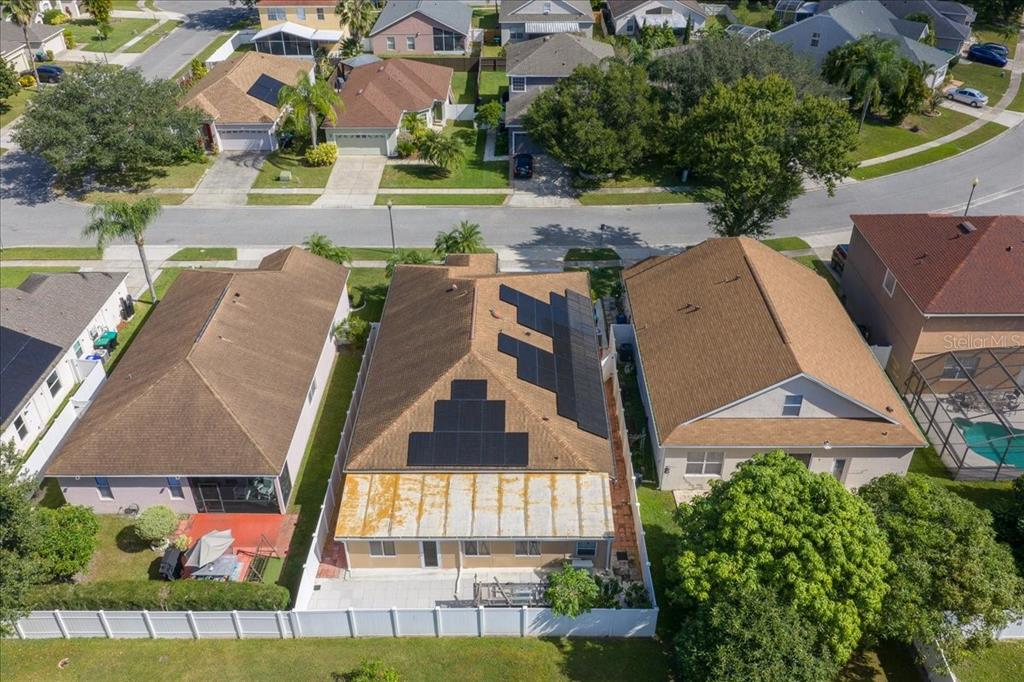 1010 Raining Meadows Lane Orlando, FL 32824 - Photo 57 of 57 an aerial view of multiple houses with yard