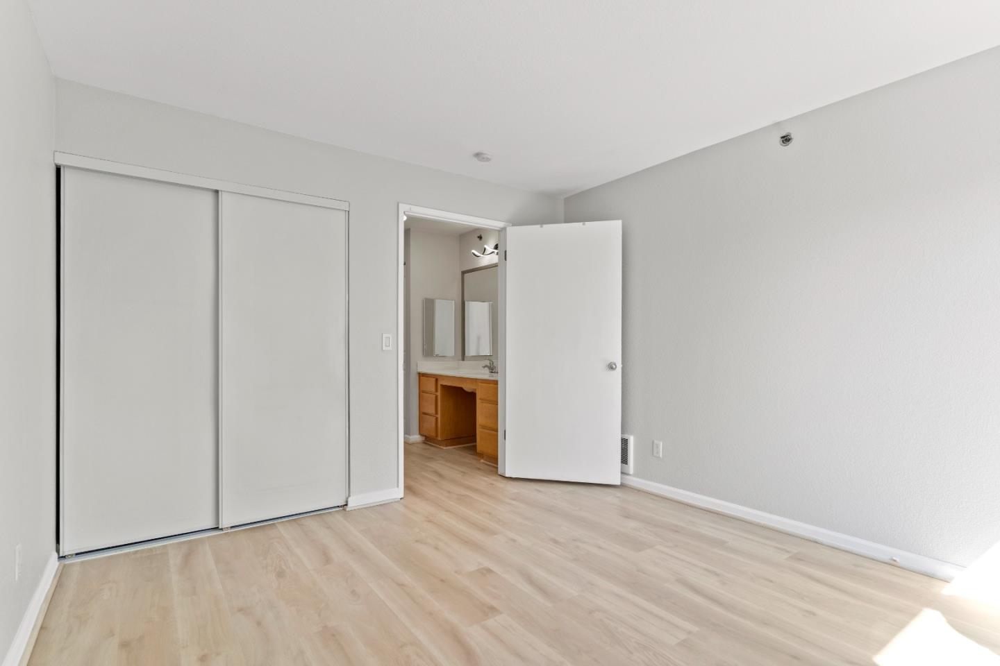 29581 Highgate Drive, Unit 219 Hayward, CA 94544 - Photo 17 of 24 a view of an empty room with closet and a window
