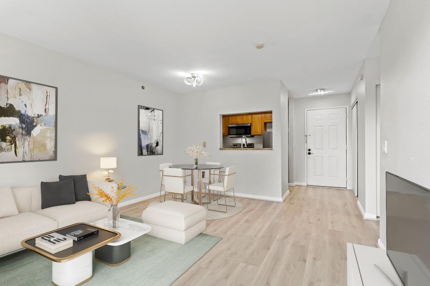 29581 Highgate Drive, Unit 219 Hayward, CA 94544 - Photo 3 of 24 a living room with furniture and a flat screen tv