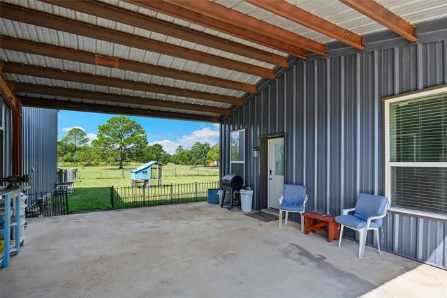 a view of porch with seating space