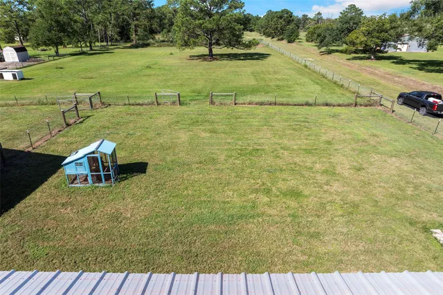 a view of a lake with a yard
