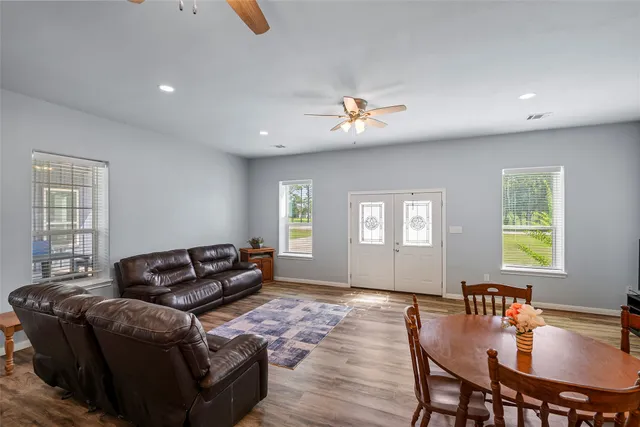a living room with furniture and window