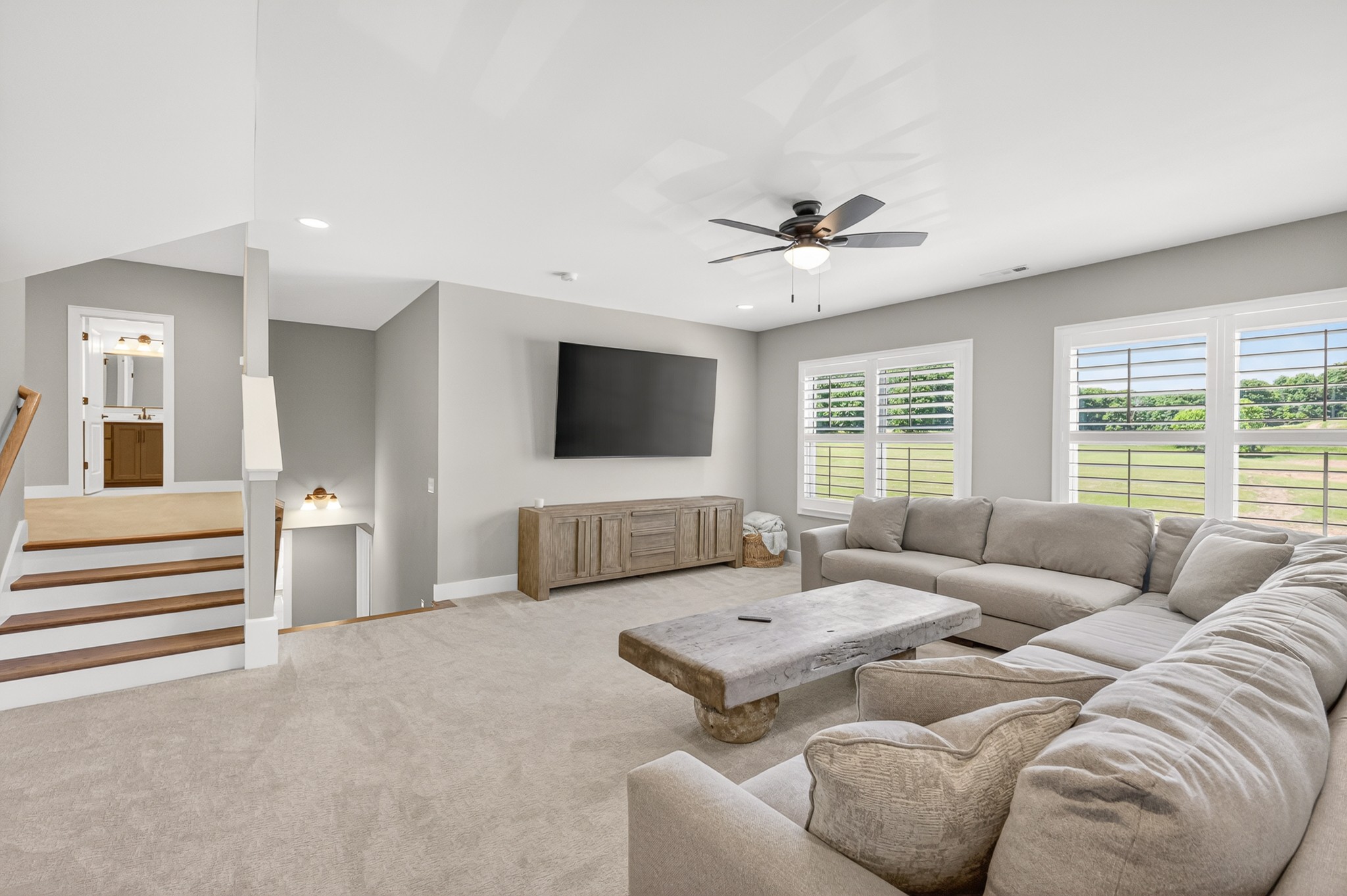 1176 Iron Bridge Road Columbia, TN 38401 - Photo 38 of 53 a living room with furniture and a flat screen tv