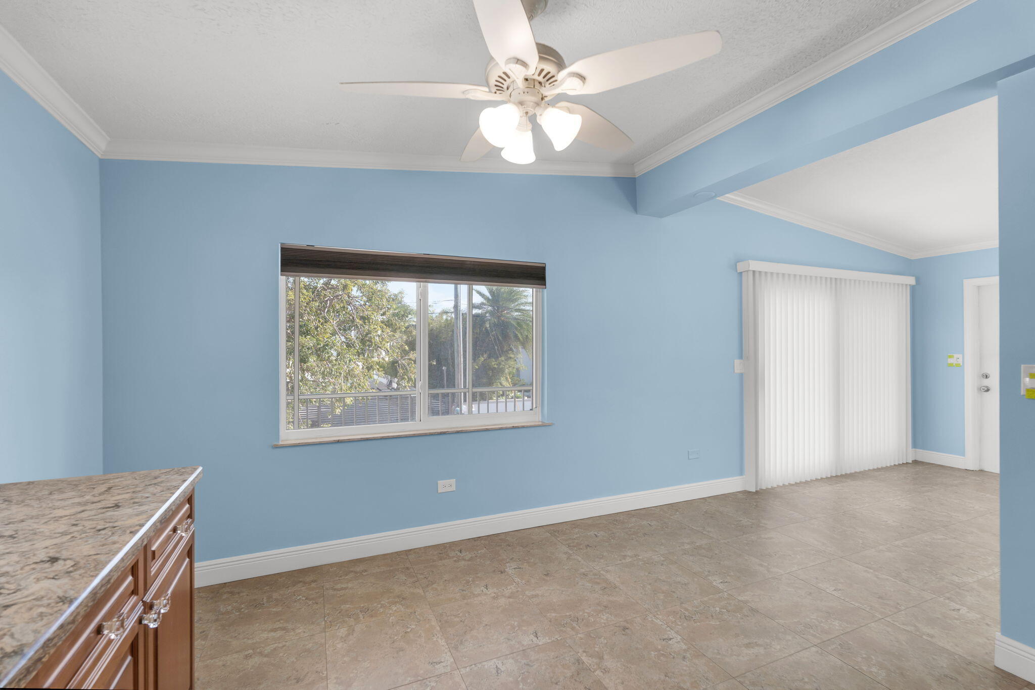 527 Sound Drive Key Largo, FL 33037 - Photo 26 of 50 an empty room with windows and fan