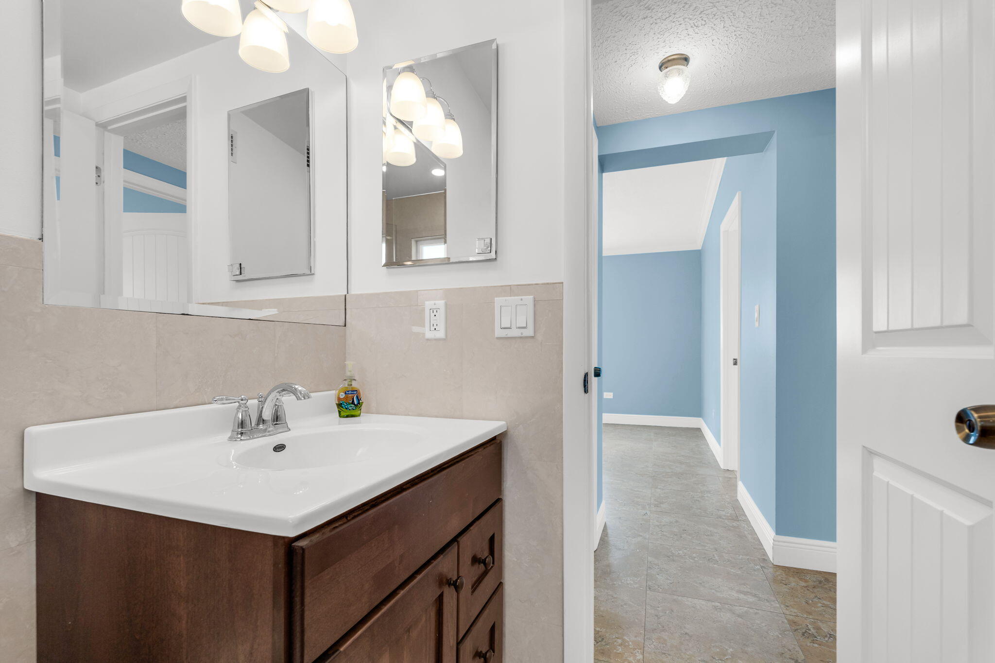 527 Sound Drive Key Largo, FL 33037 - Photo 30 of 50 a bathroom with a sink and a mirror