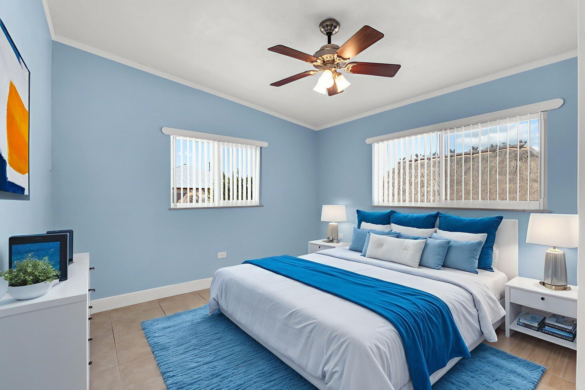 527 Sound Drive Key Largo, FL 33037 - Photo 31 of 50 a bedroom with a large bed and a chandelier