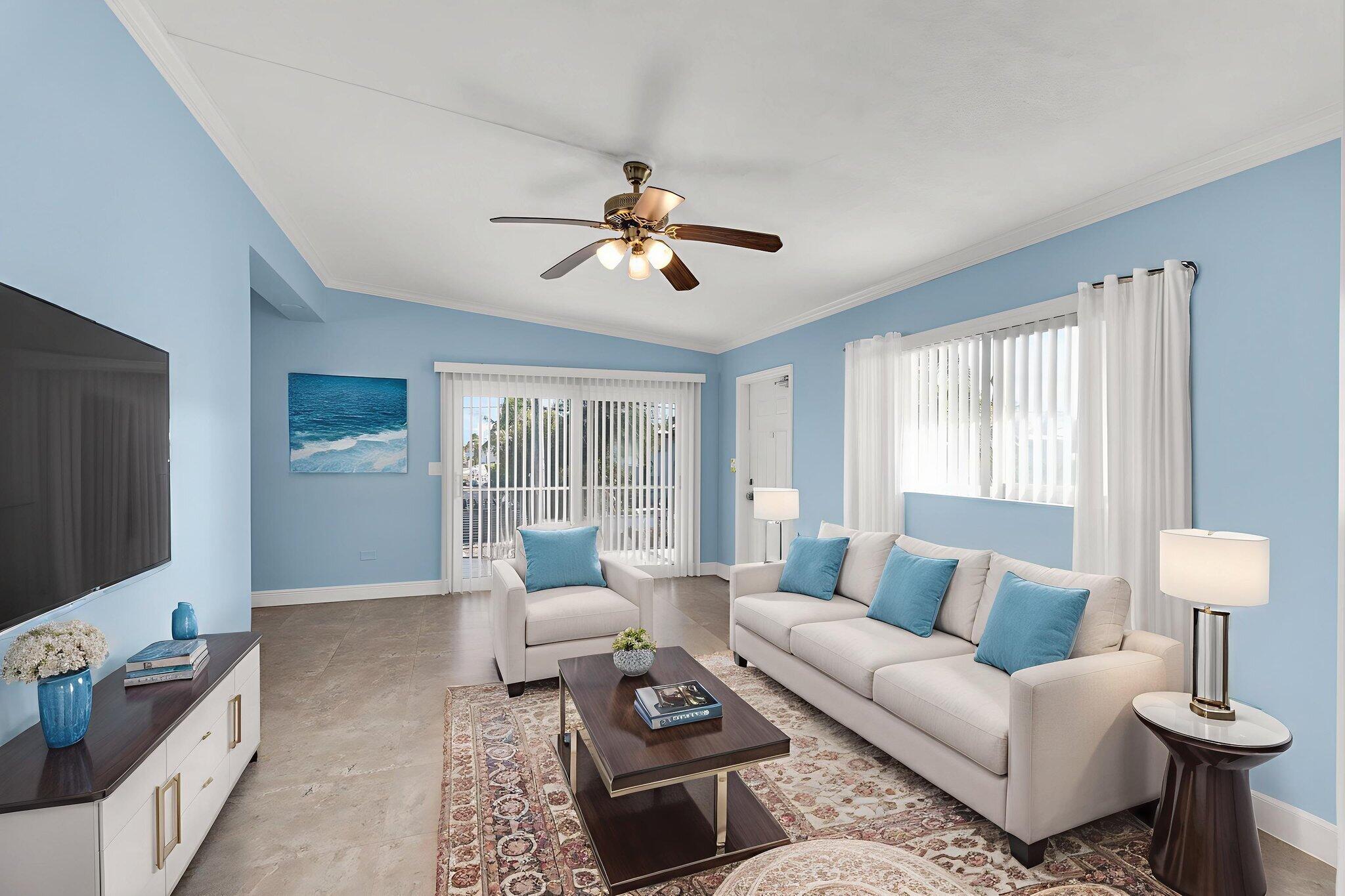 527 Sound Drive Key Largo, FL 33037 - Photo 4 of 50 a living room with furniture and a flat screen tv