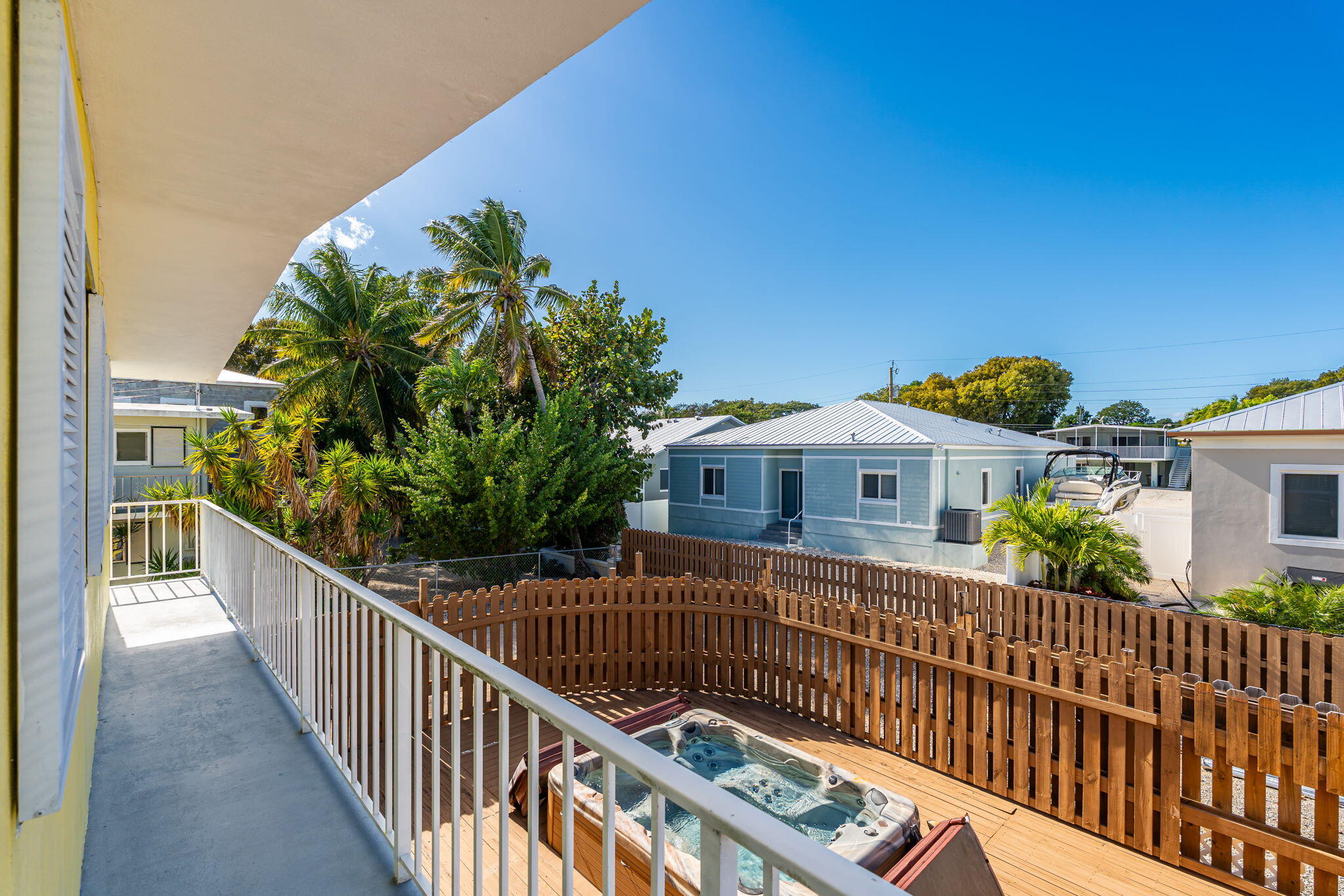 527 Sound Drive Key Largo, FL 33037 - Photo 41 of 50 a view of a house with wooden fence