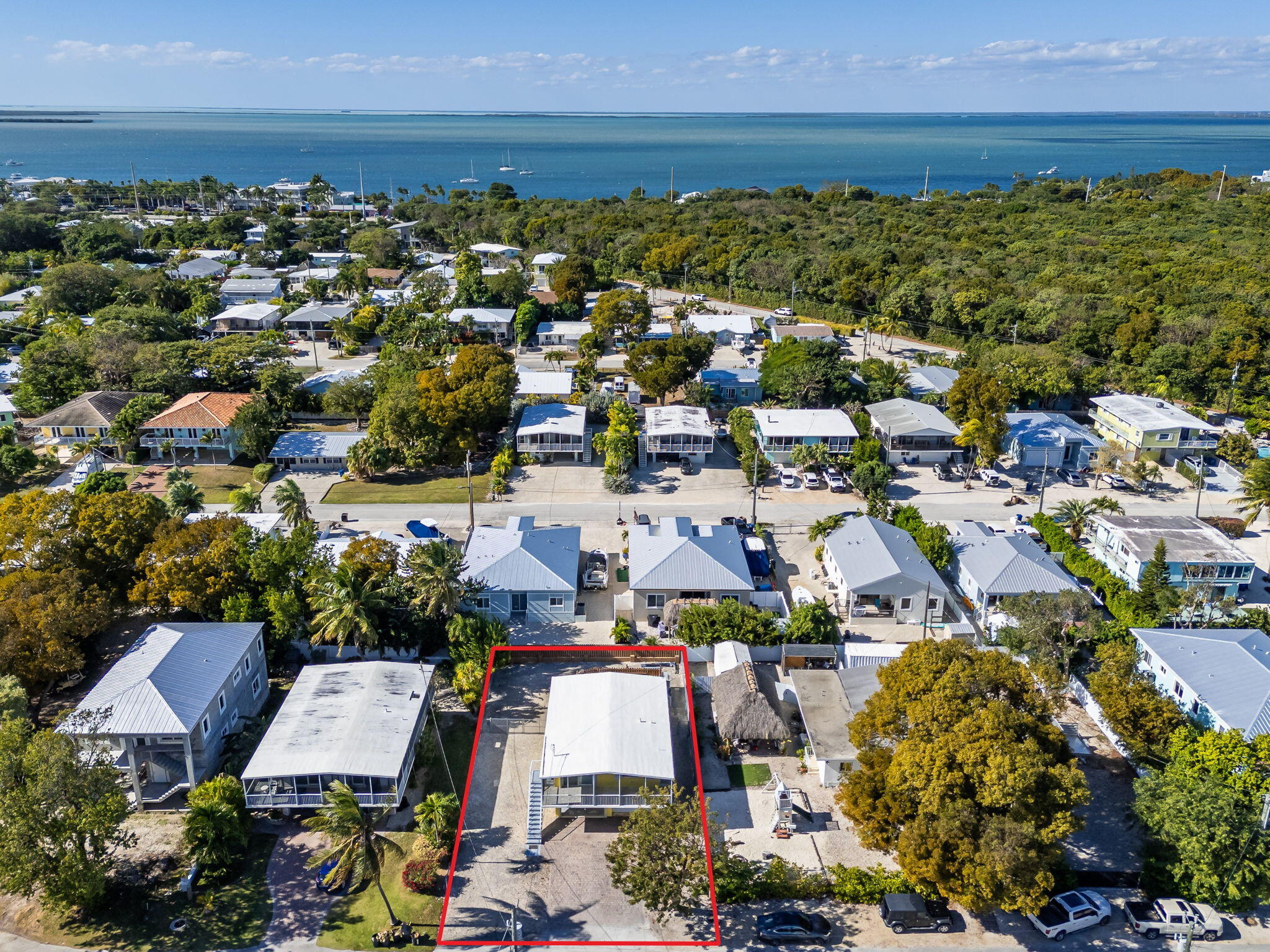 527 Sound Drive Key Largo, FL 33037 - Photo 45 of 50 an aerial view of residential building and lake