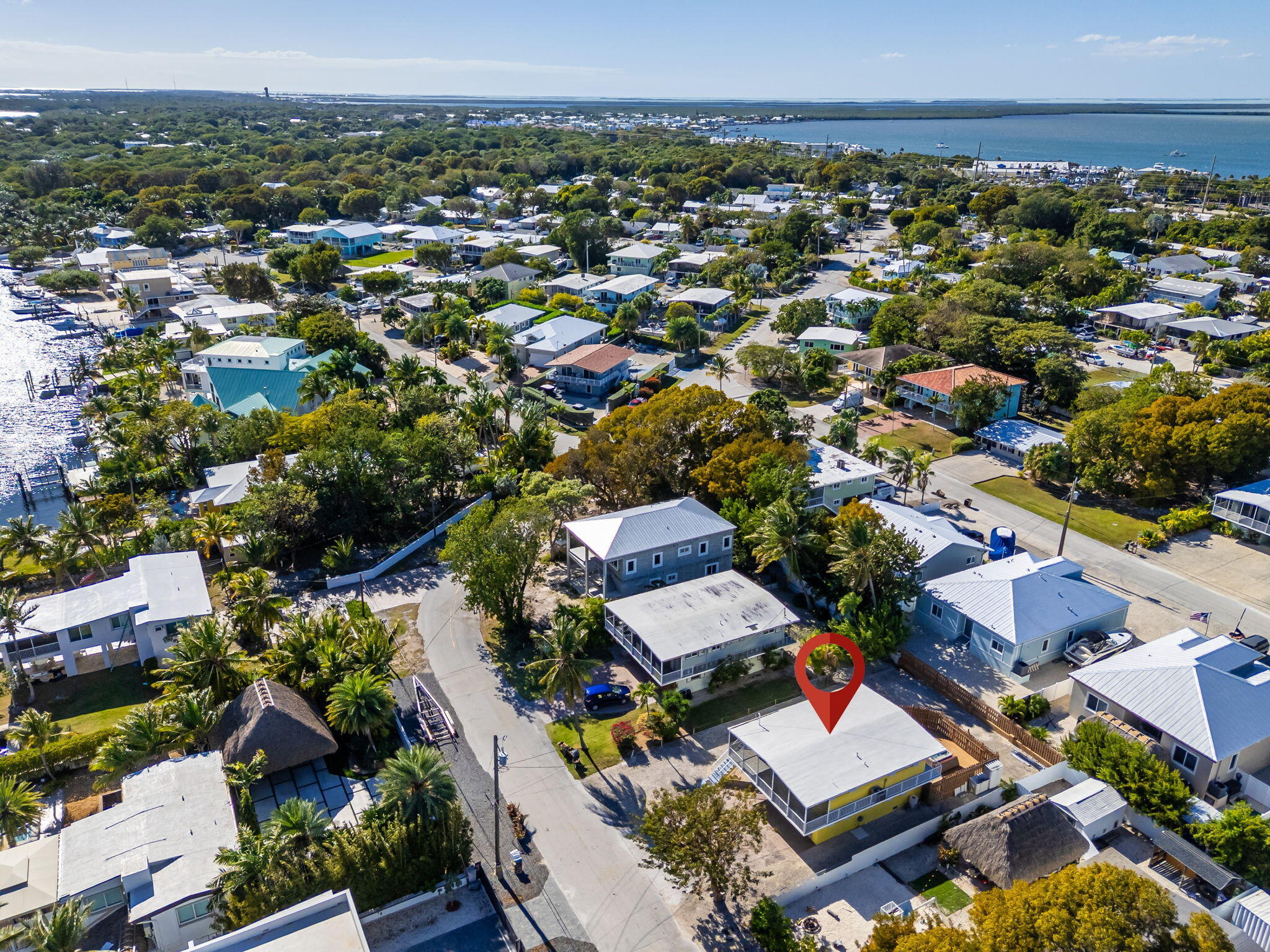 527 Sound Drive Key Largo, FL 33037 - Photo 46 of 50 an aerial view of a city with lots of residential buildings