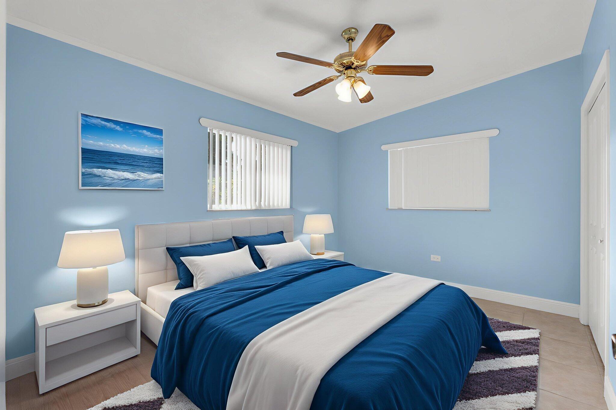 527 Sound Drive Key Largo, FL 33037 - Photo 7 of 50 a bedroom with a bed and a lamp