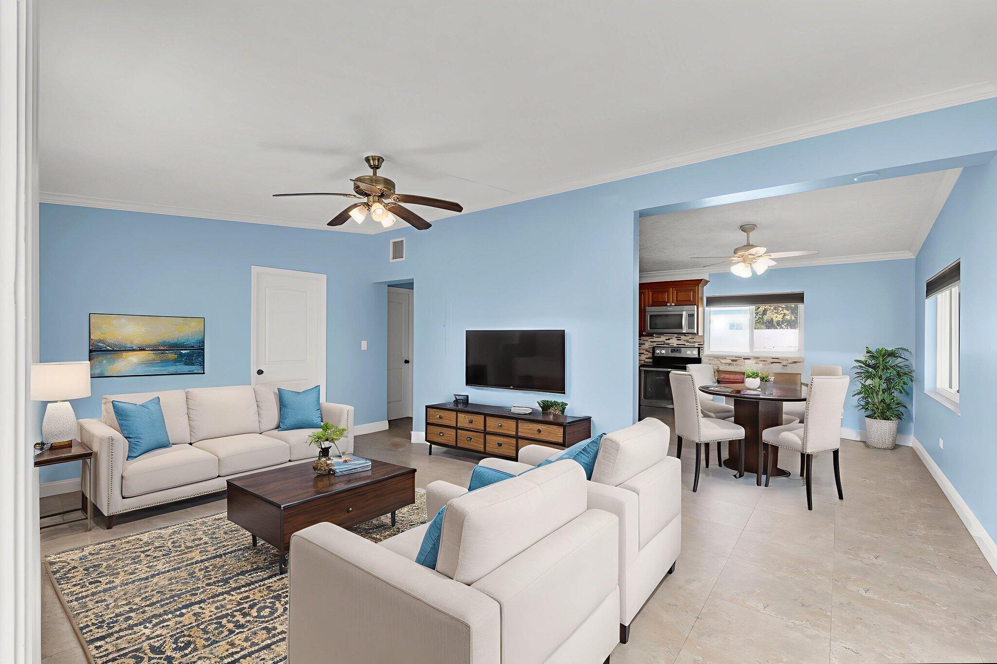 527 Sound Drive Key Largo, FL 33037 - Photo 10 of 50 a living room with furniture and a flat screen tv