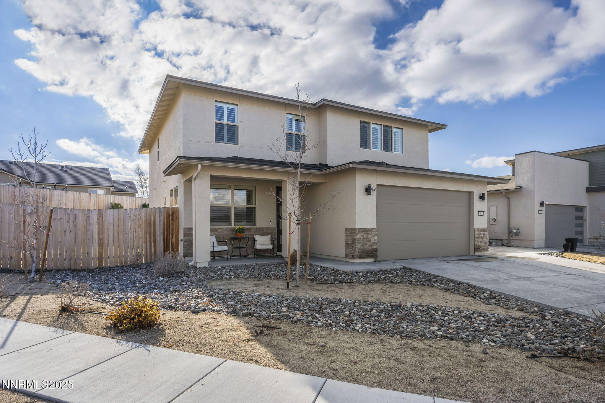 7181 Mustengo Drive Reno, NV 89506 - Photo 2 of 37 a view of a house with a backyard
