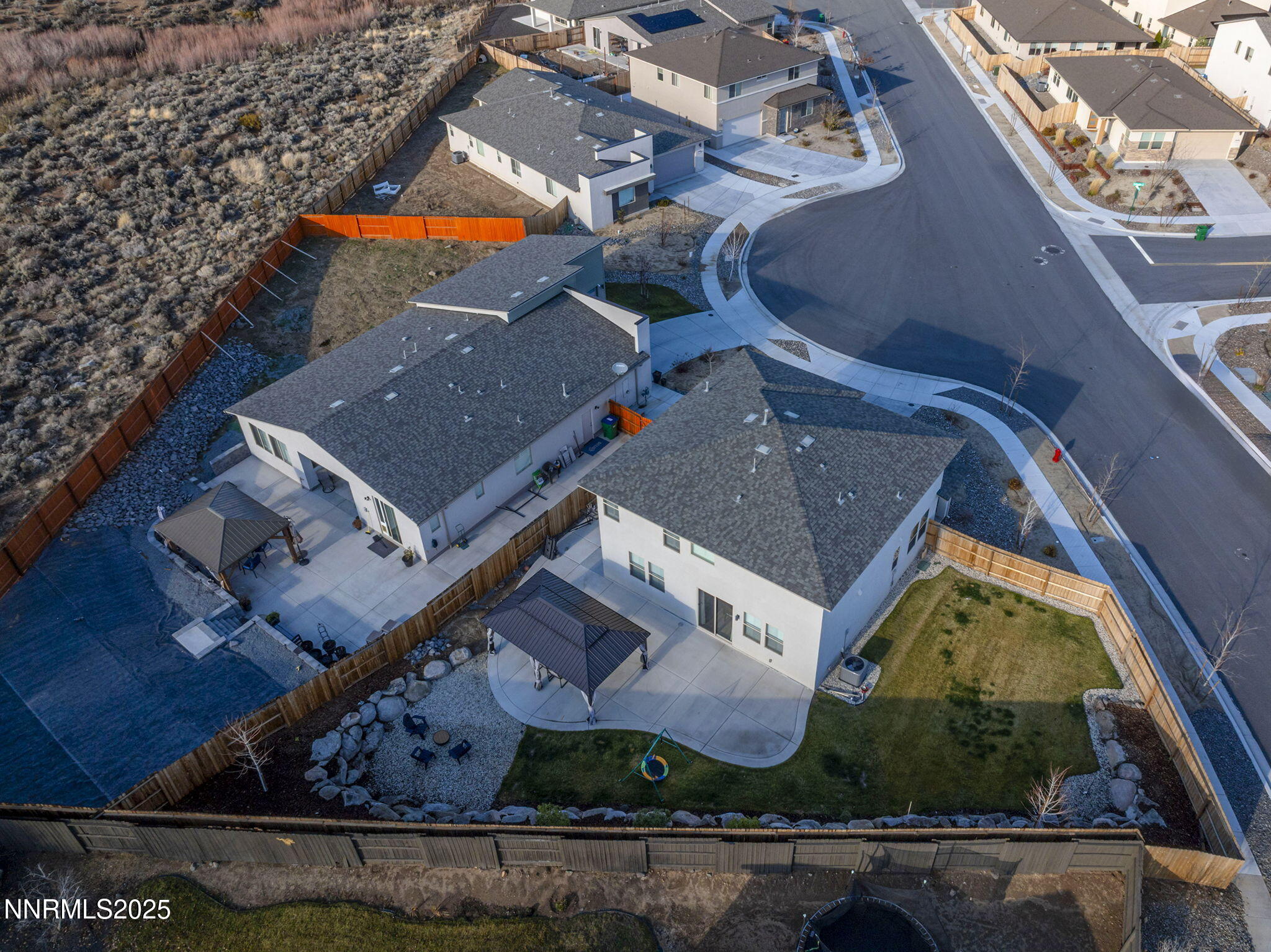 7181 Mustengo Drive Reno, NV 89506 - Photo 29 of 37 an aerial view of residential houses with outdoor space
