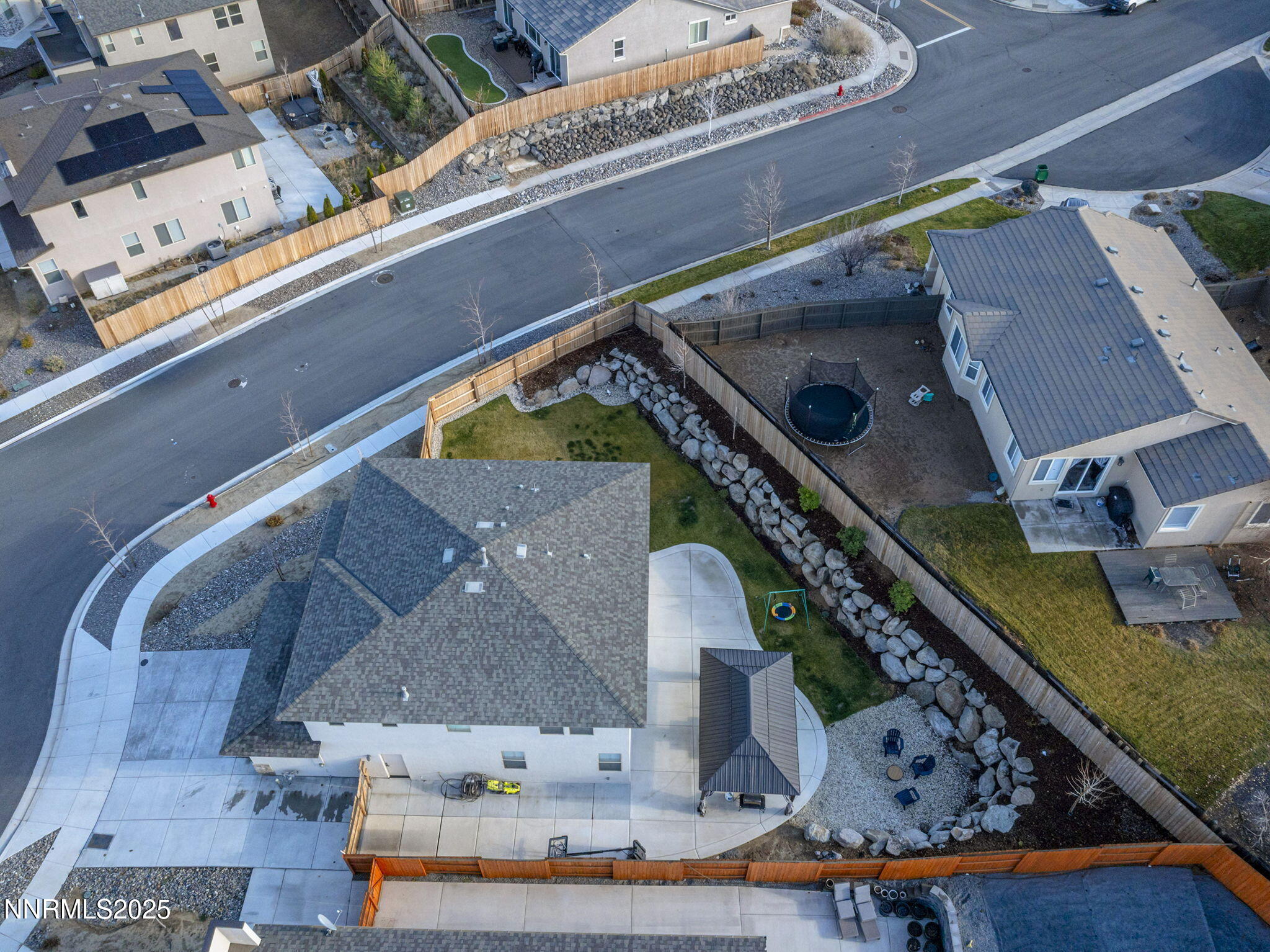 7181 Mustengo Drive Reno, NV 89506 - Photo 30 of 37 a picture of a building with a swimming pool