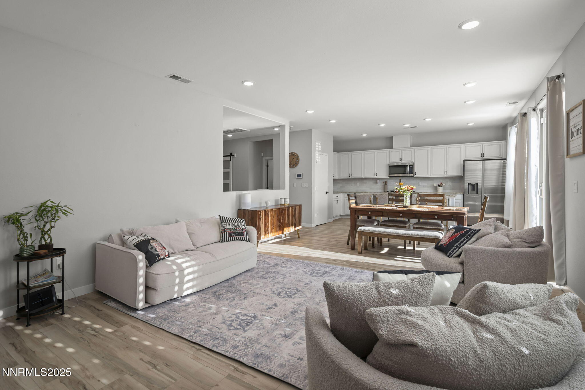 7181 Mustengo Drive Reno, NV 89506 - Photo 10 of 37 a living room with furniture and kitchen view