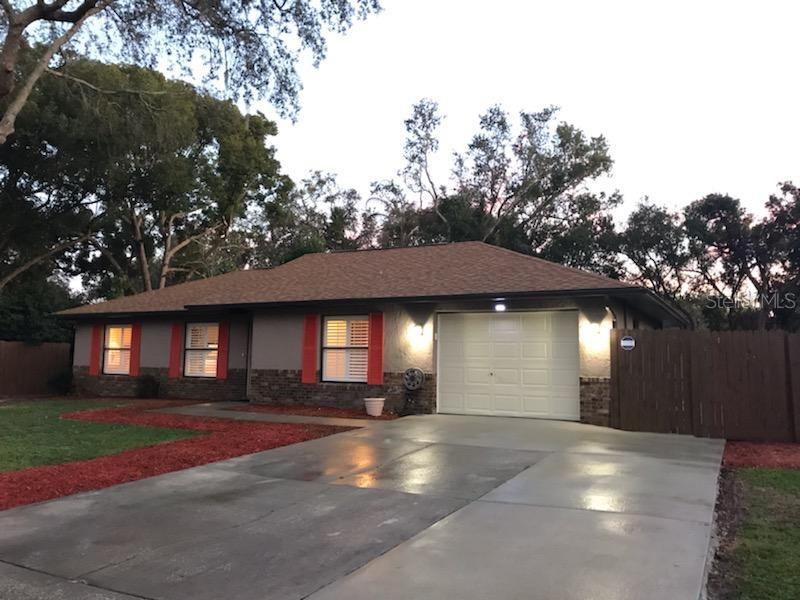 13 Granada Road DeBary, FL 32713 - Photo 1 of 1 a front view of a house with a yard