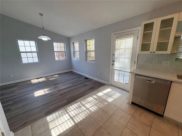 an empty room with windows