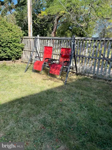 a view of houses with yard