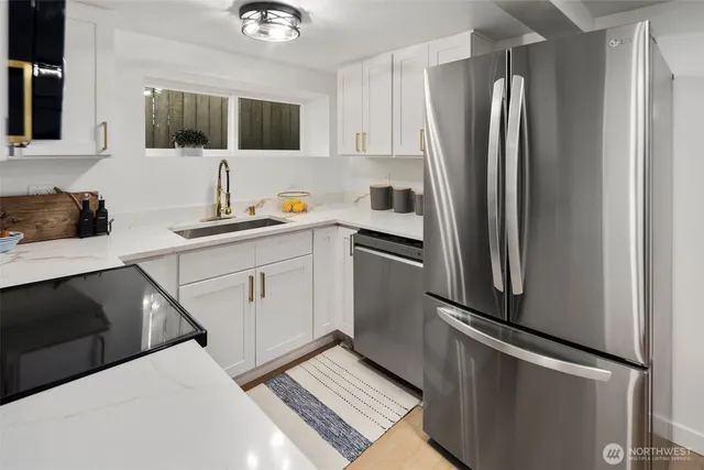 a view of a livingroom with furniture and a mirror