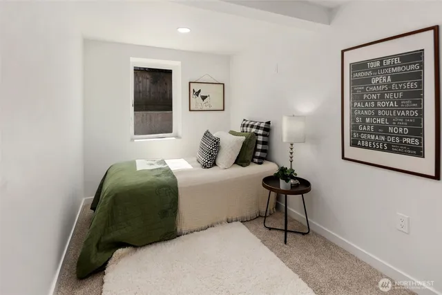 a view of a house with a yard and deck