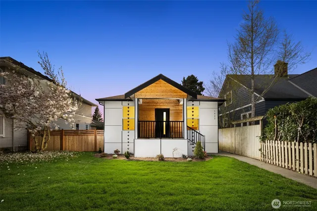 an aerial view of a house with a garden