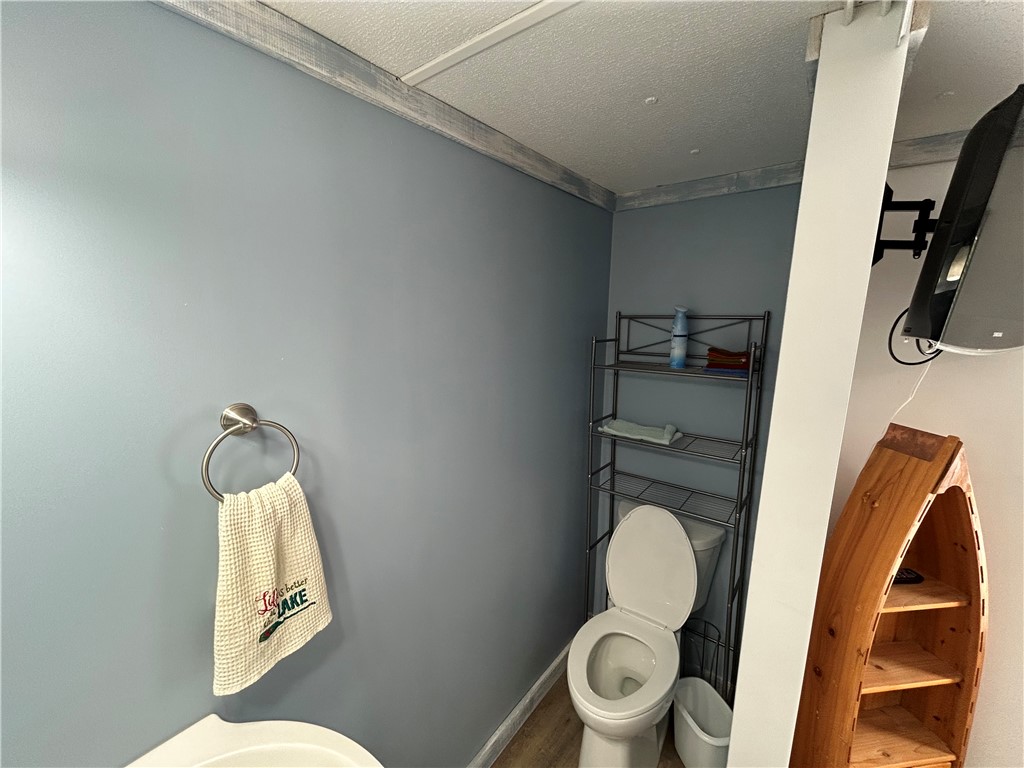 43 Sunset Cove Road Abbeville, SC 29620 - Photo 19 of 41 This functional bathroom features practical design and a calm ambiance.