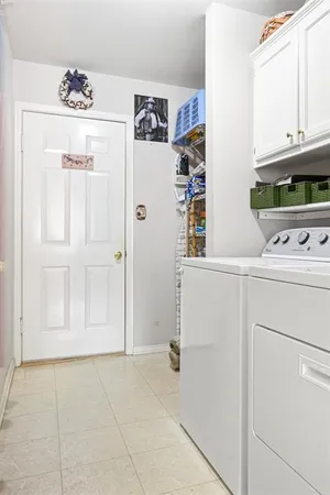 a bedroom with bed and window