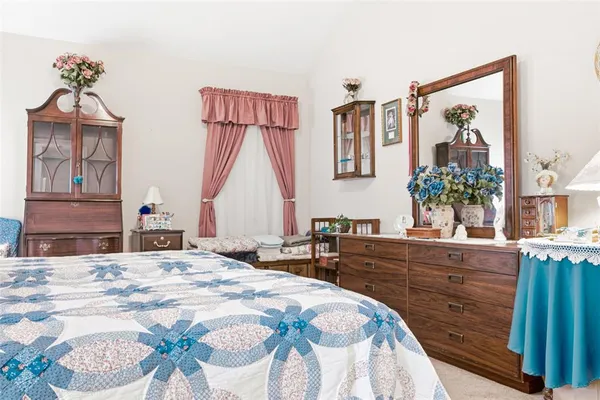 a bathroom with a double vanity sink mirror and