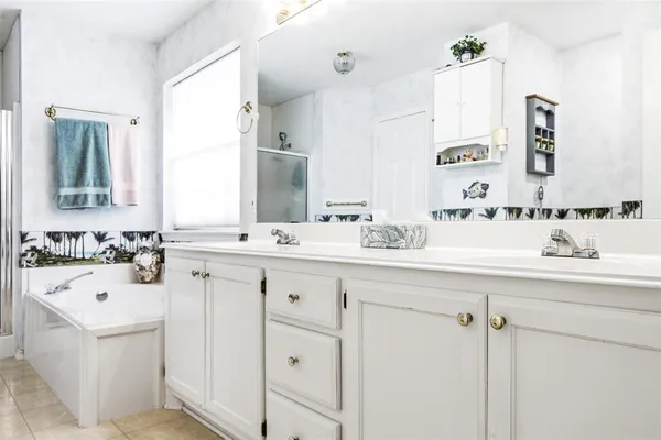 a kitchen with appliances and a shower