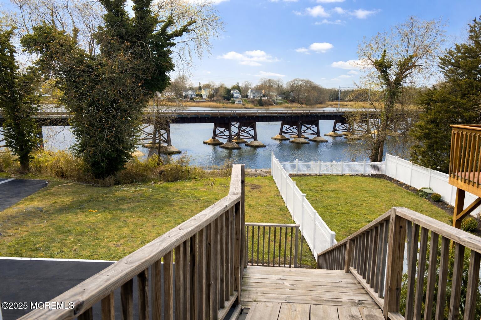 23 Rector Place, Unit B Red Bank, NJ 07701 - Photo 5 of 9 a view of a swimming pool with a lounge chairs