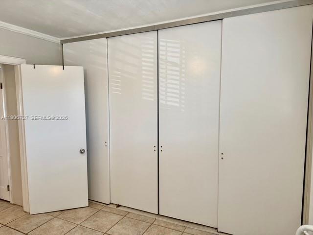 301 East McNab Road, Unit 205 Pompano Beach, FL 33060 - Photo 13 of 23 a bathroom with a glass shower door