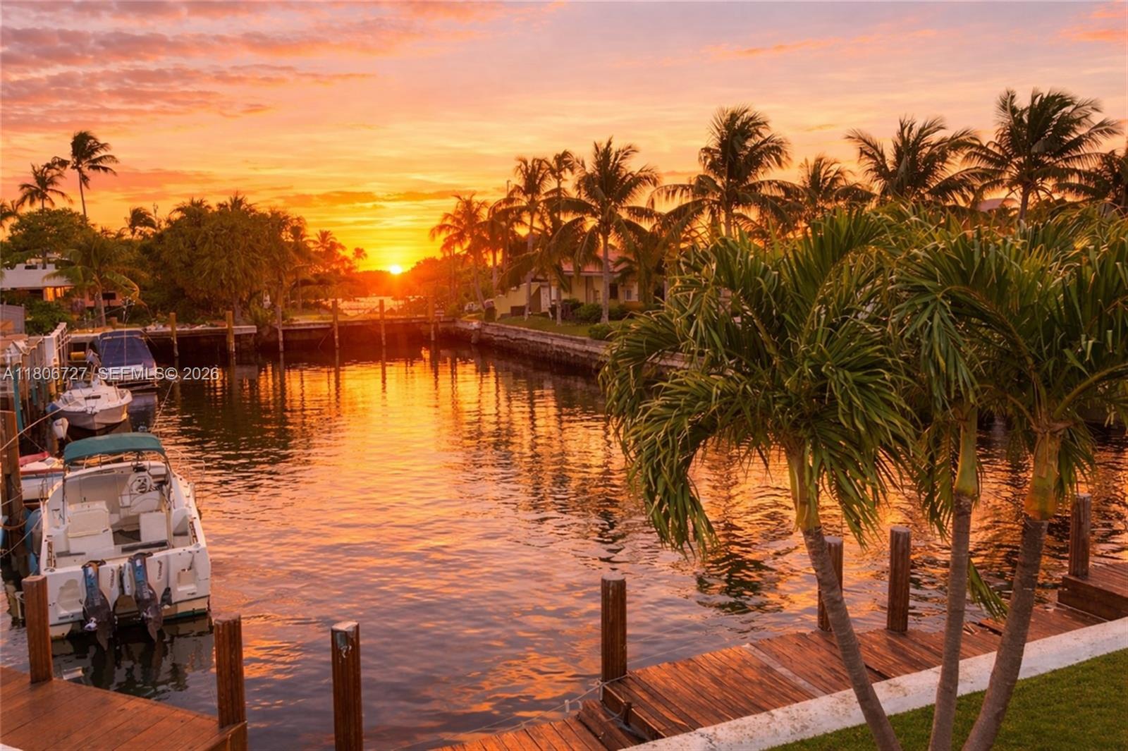 301 East McNab Road, Unit 205 Pompano Beach, FL 33060 - Photo 2 of 23 a view of a lake