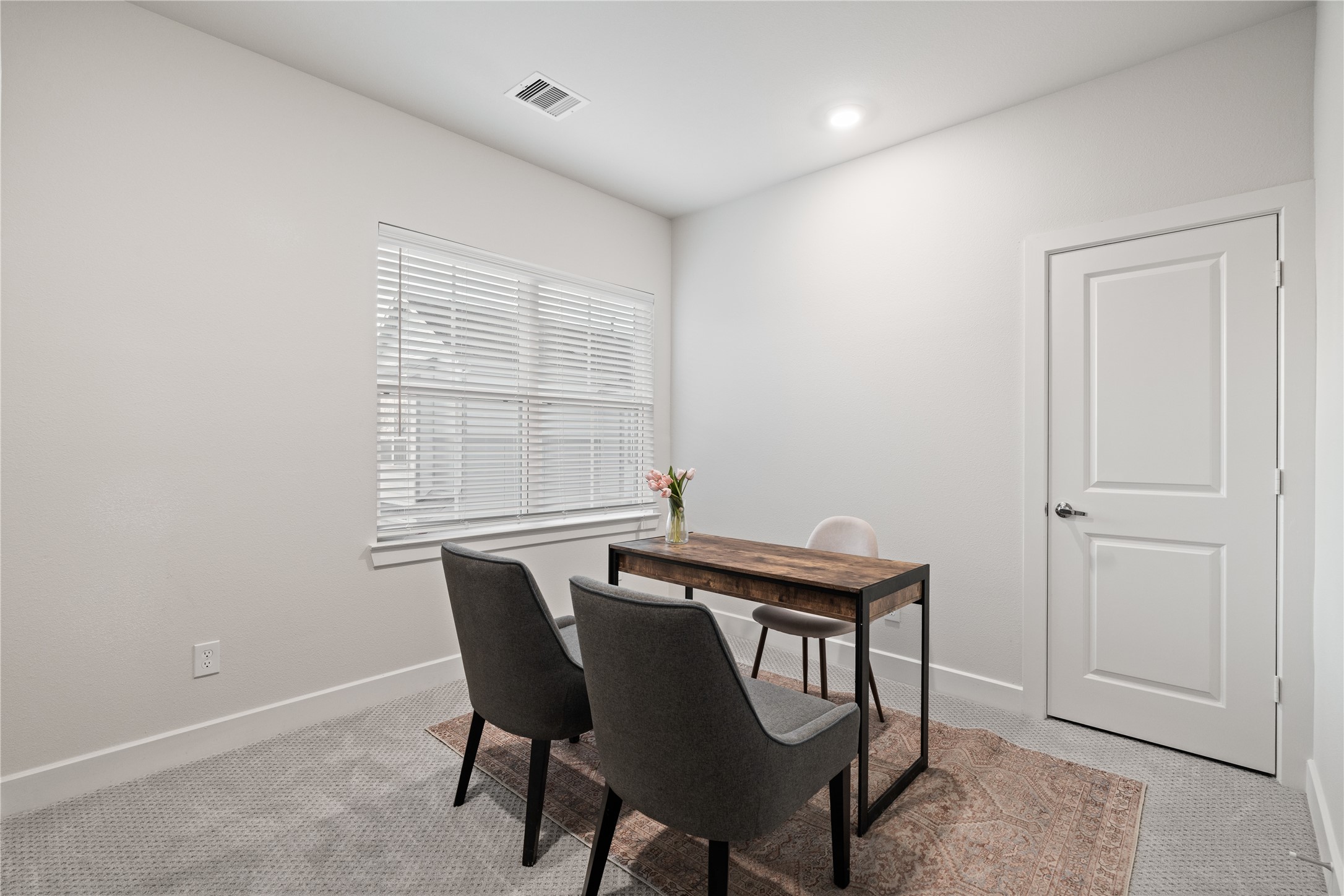 6445 Rena Street Houston, TX 77092 - Photo 26 of 33 Secondary bedroom with soft natural light and flexible layout potential.