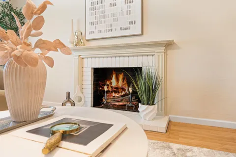 a kitchen with stainless steel appliances granite countertop a sink stove and microwave