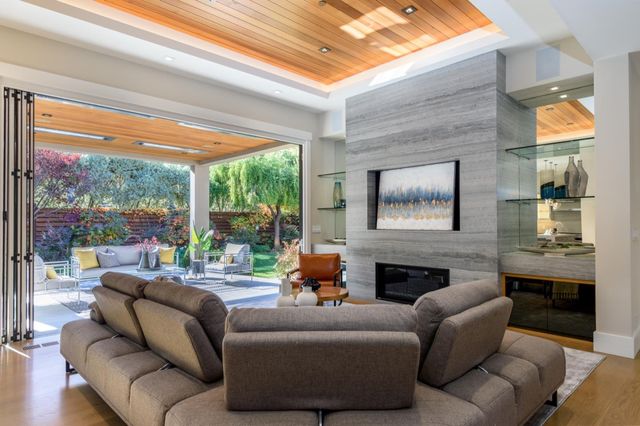 a living room with furniture and a table