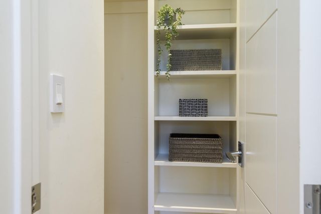 a bathroom with a sink vanity and a mirror
