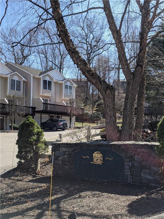 40 Trolley Bridge Road, Unit 6 Shelton, CT 06484 - Photo 1 of 1 a front view of a house with yard porch and sitting area